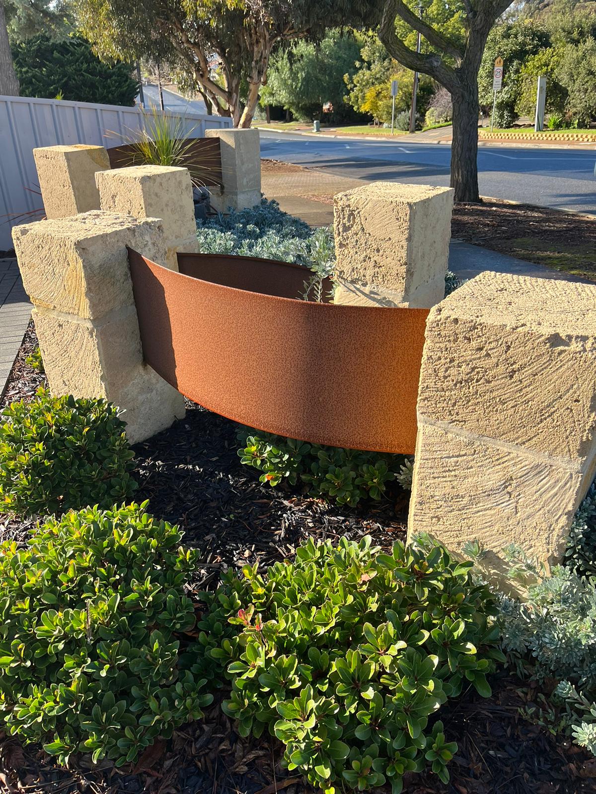 Earthbound landscaping garden feature art feature